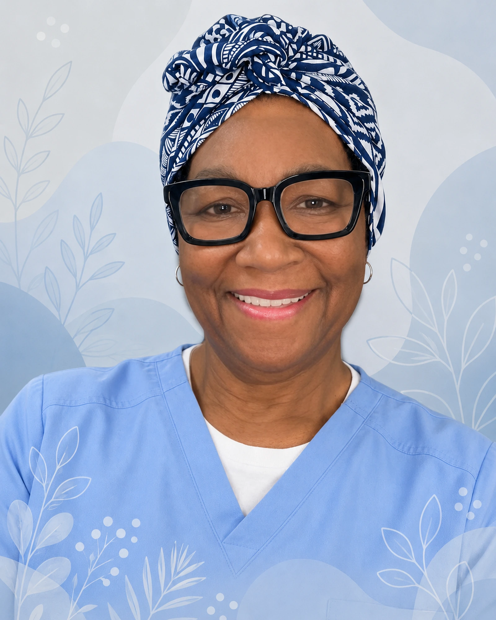 Bertha I. Bowles smiling in caregiver attire